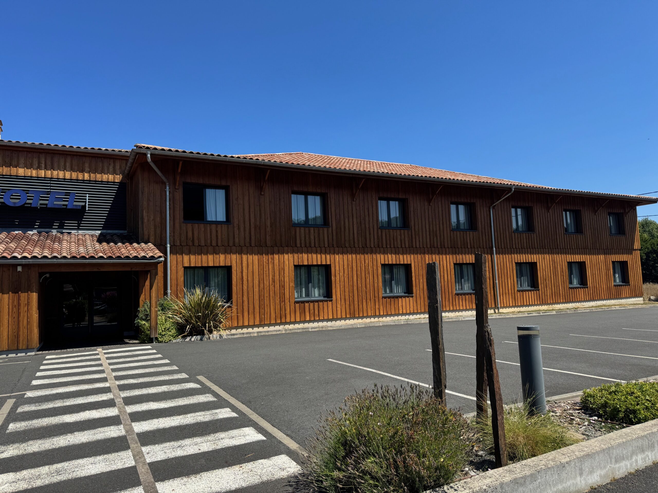 Apllication OBBIASAT Application d'un saturateur sur bardage bois
