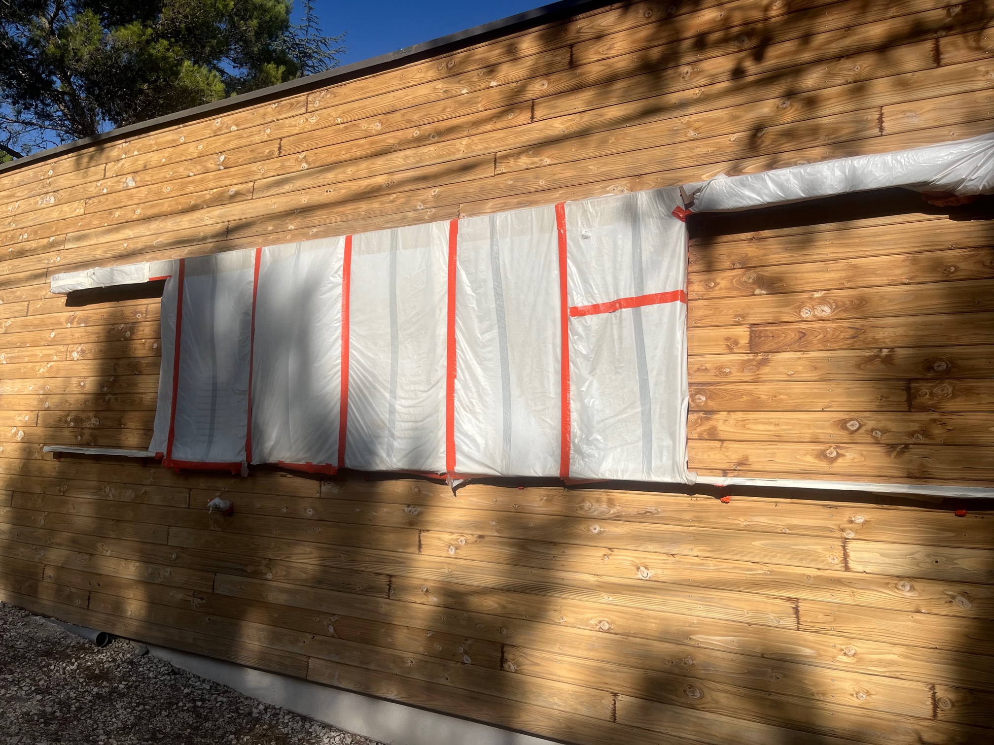 AÉROGOMMAGE D'UN BARDAGE BOIS